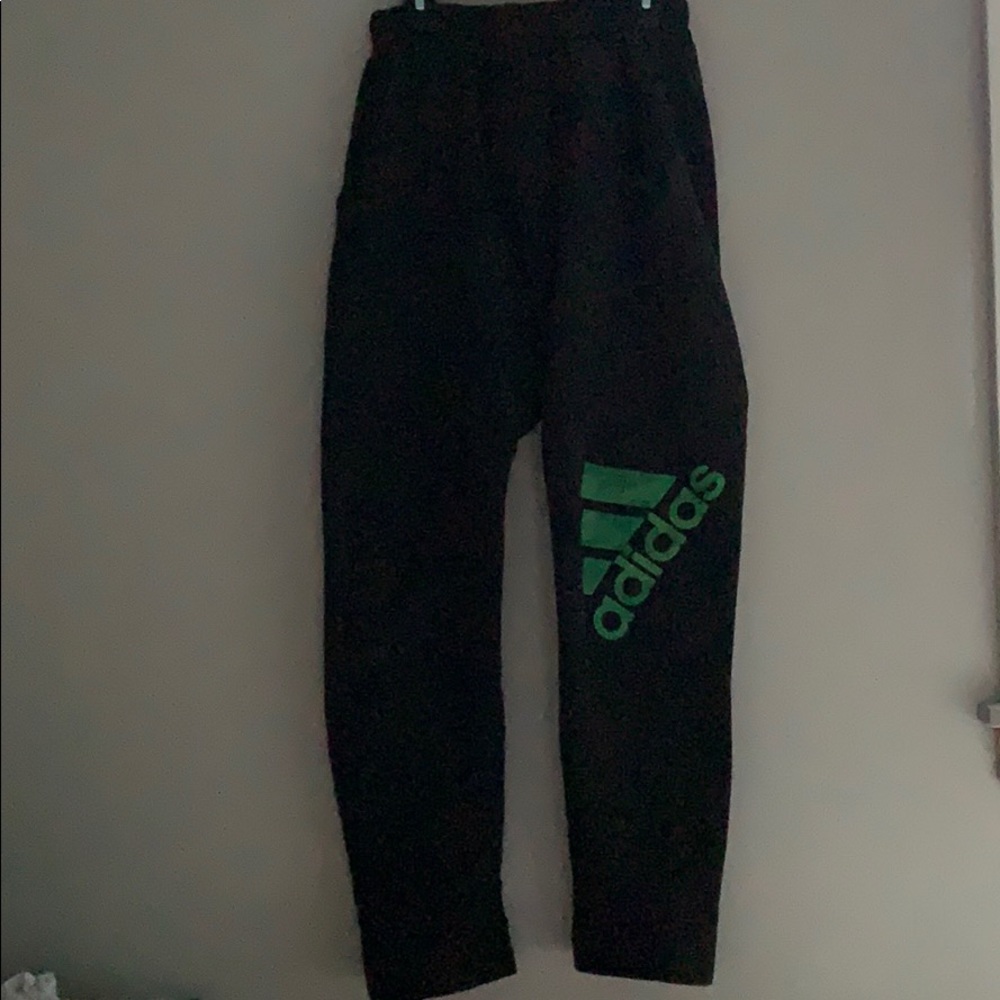 Black adidas sweats with green camo design